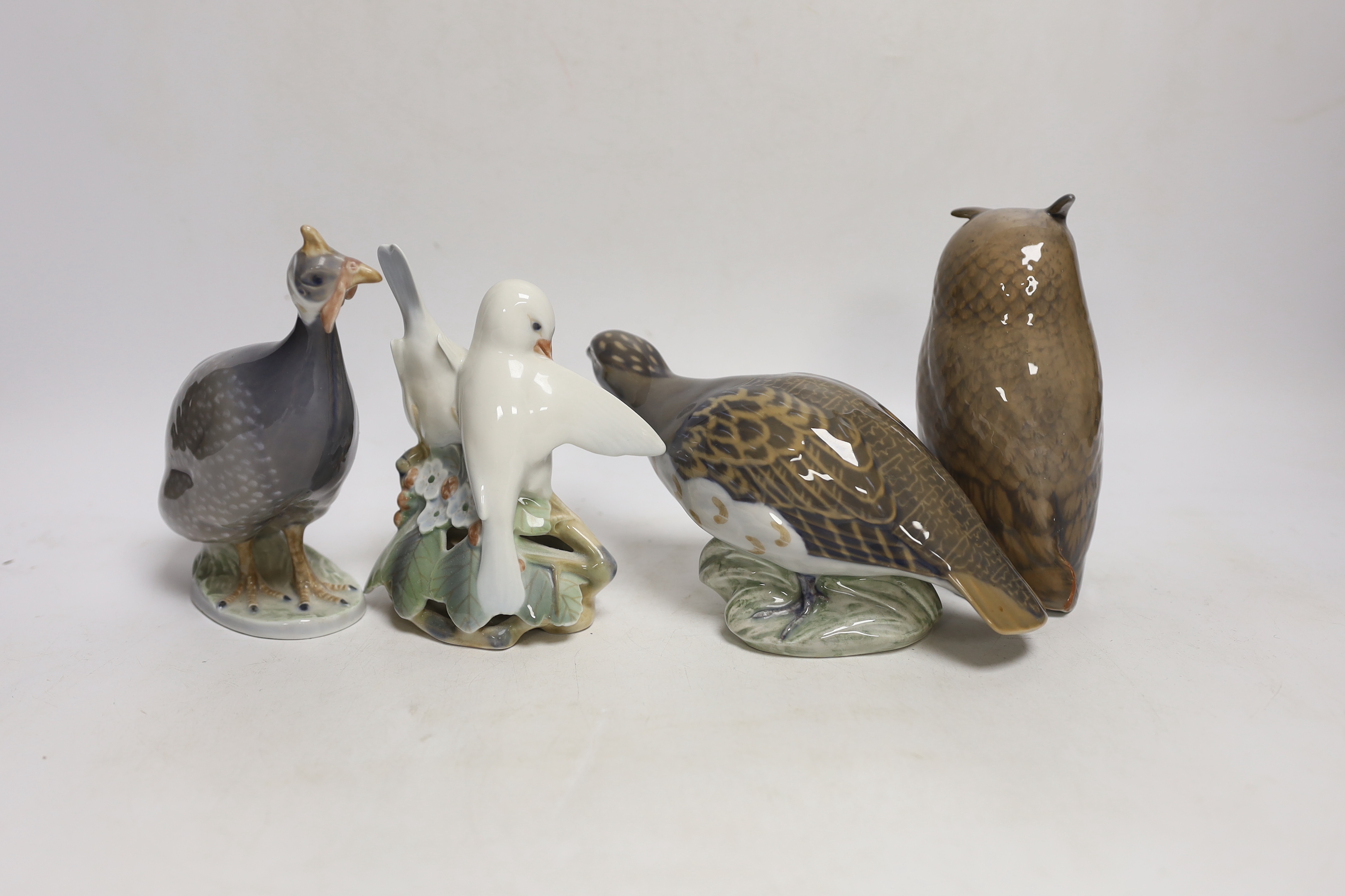 A six Royal Copenhagen birds including a swan and an owl, largest 17cm wide